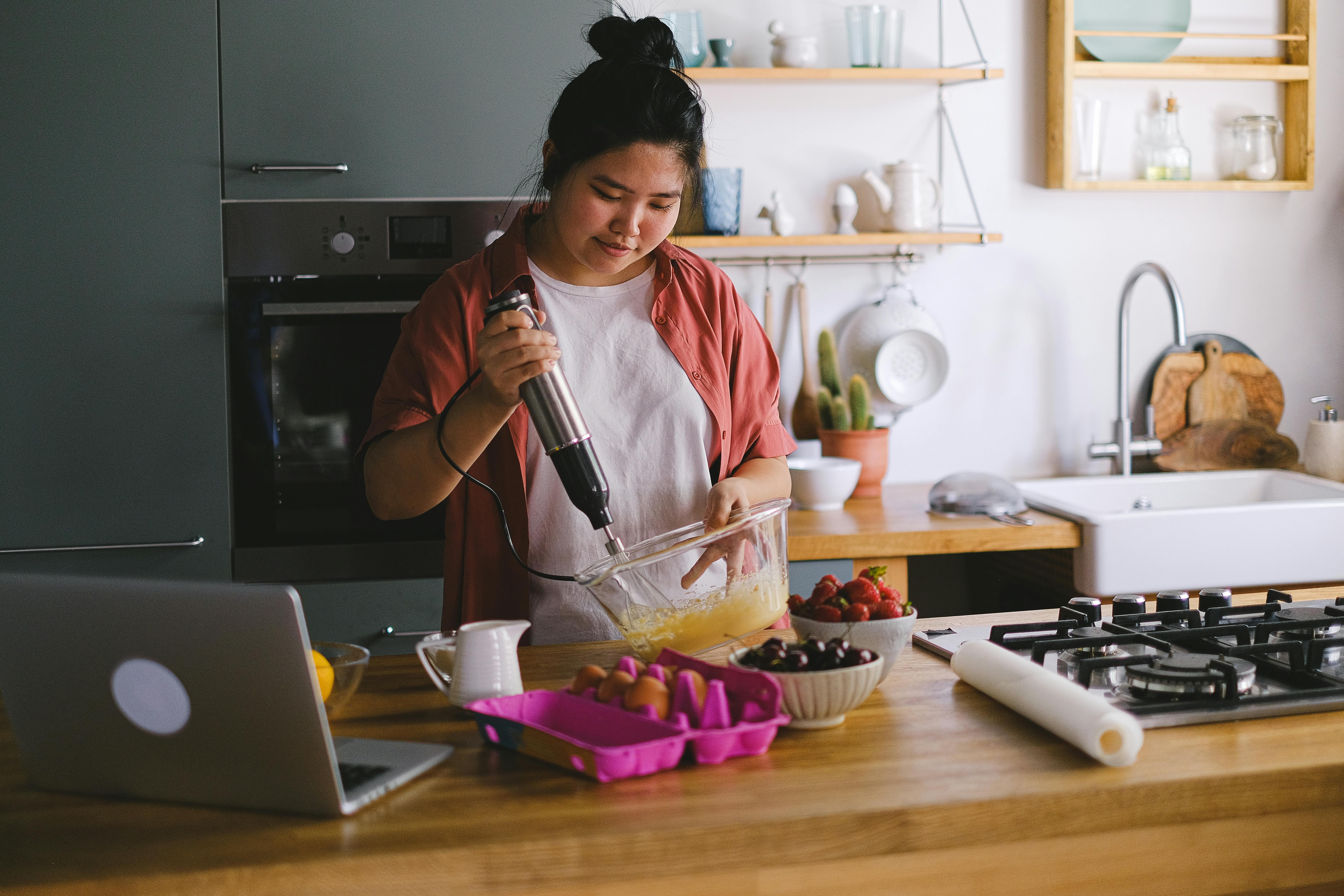 woman cooking in kitchen